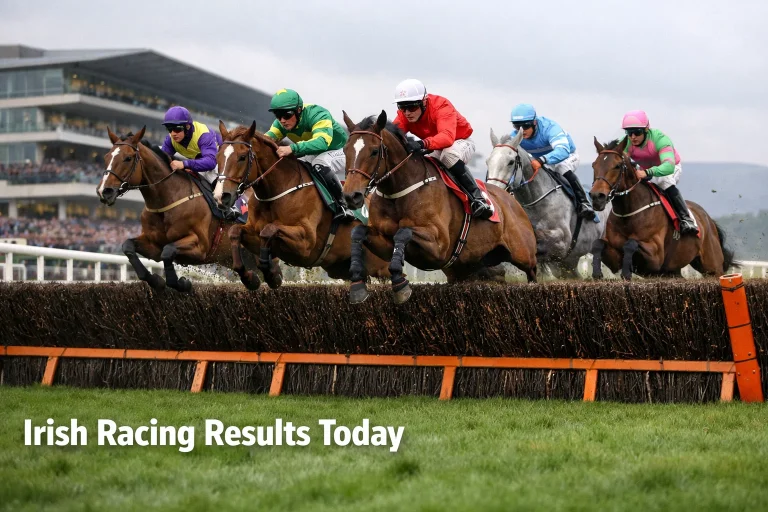 Racehorses jumping a hurdle at Leopardstown racecourse Dublin Ireland on a clear day